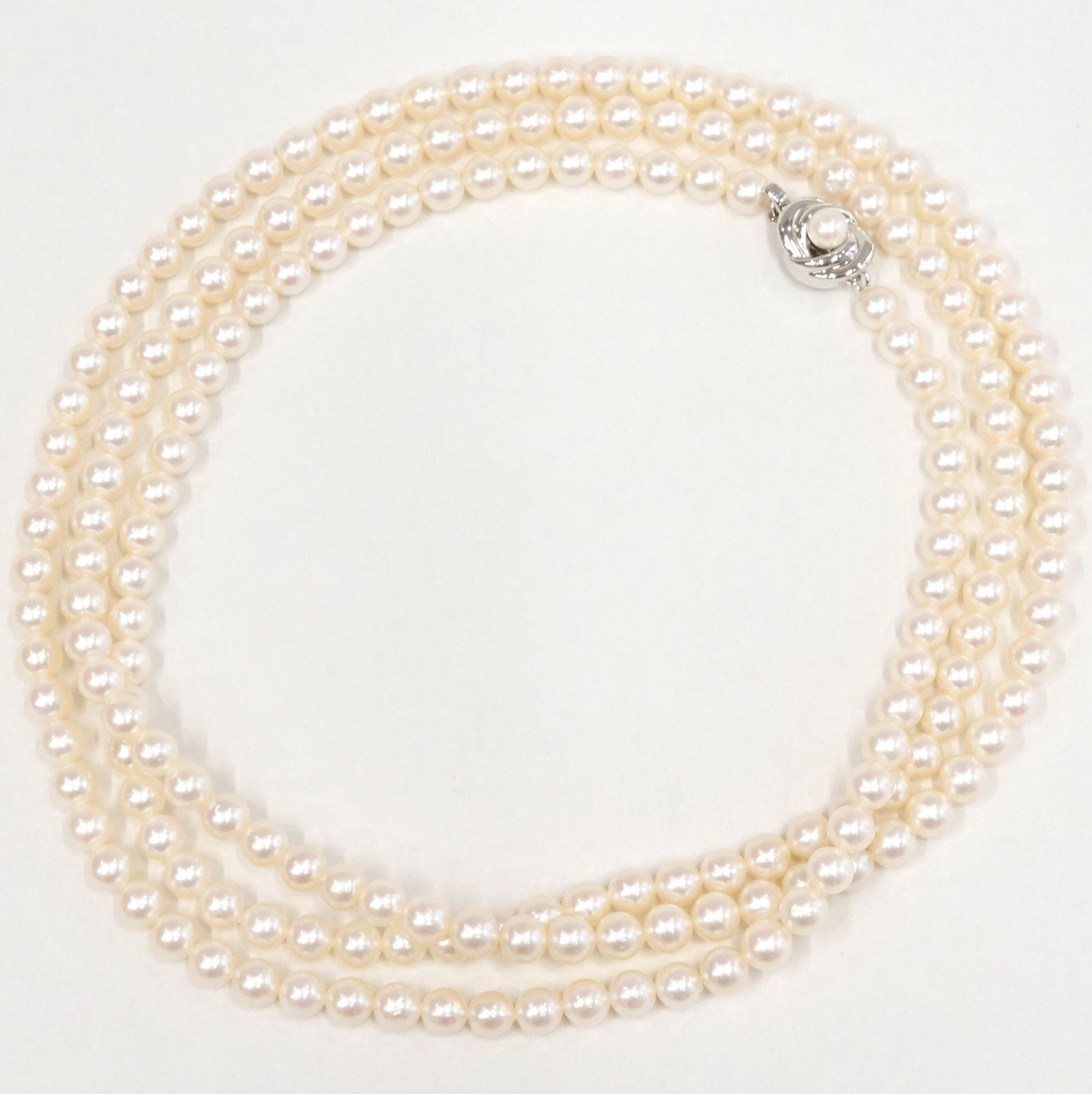 Tasaki Akoya pearl long necklace with 6.5-6.8mm pearls and silver clasp measuring 122cm