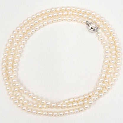 Tasaki Akoya pearl long necklace with 6.5-6.8mm pearls and silver clasp measuring 122cm