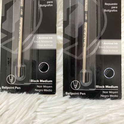 Set of seven CROSS Kuro ballpoint pen refills in black and brown with model numbers 8513 and 8514