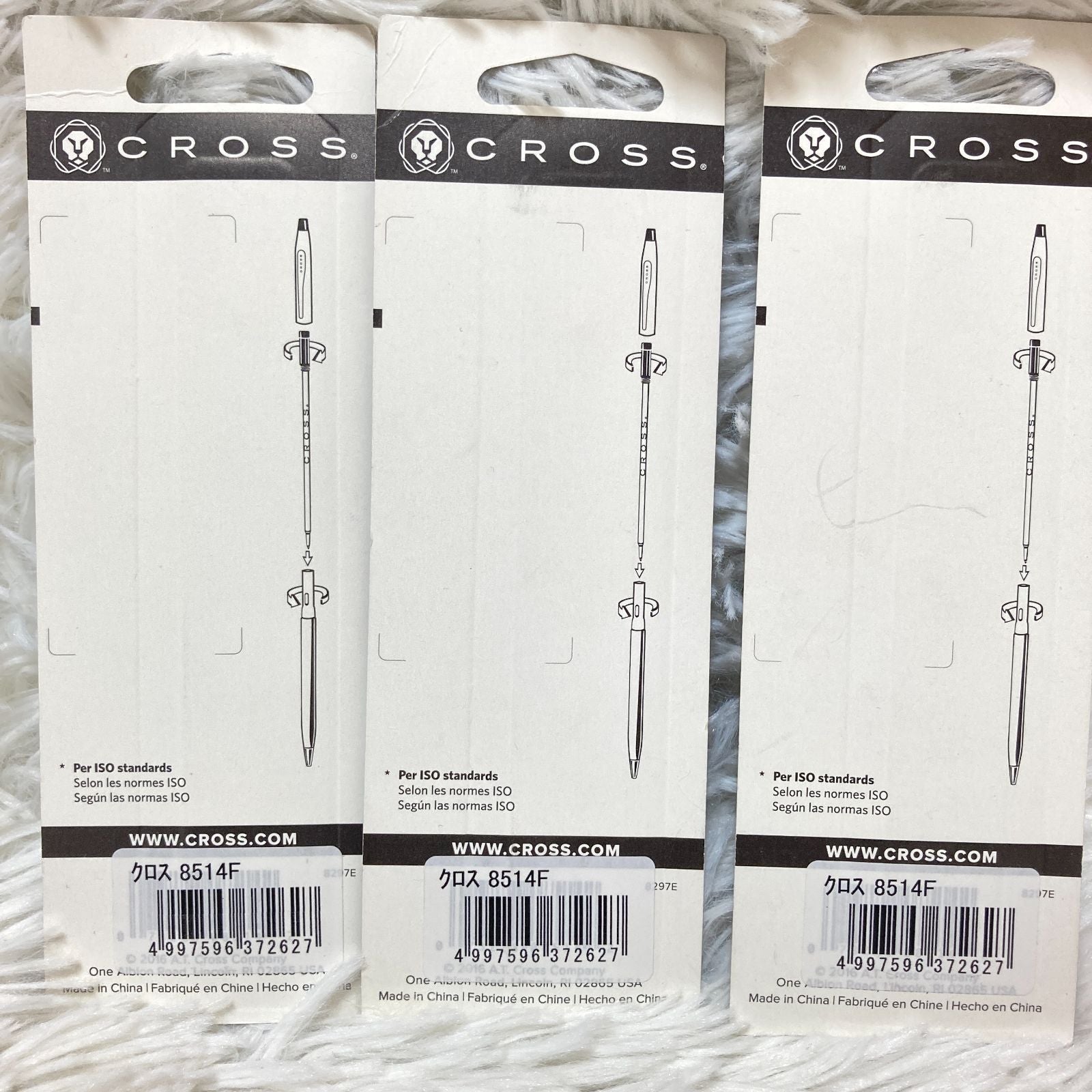 Set of seven CROSS Kuro ballpoint pen refills in black and brown with model numbers 8513 and 8514