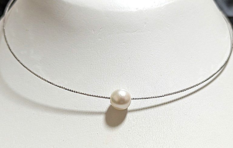 Akoya pearl Omega thread necklace with 9.5mm-9mm white slight pink round pearls and thick wrap