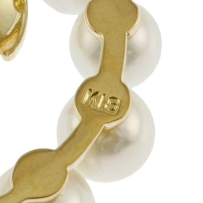 Mikimoto 18K yellow gold necklace featuring a single Akoya pearl and diamond accents for ladies