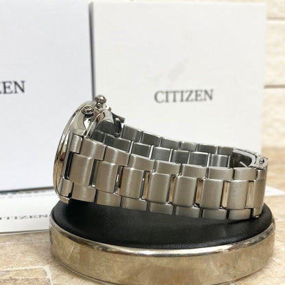 Citizen Eco-Drive men's radio-controlled watch model H415-S112907 with silver case and black band