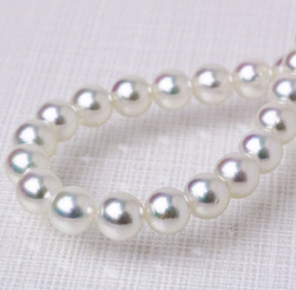 Akoya pearl necklace featuring 7.5 to 8mm round pearls with thick wrap and certification
