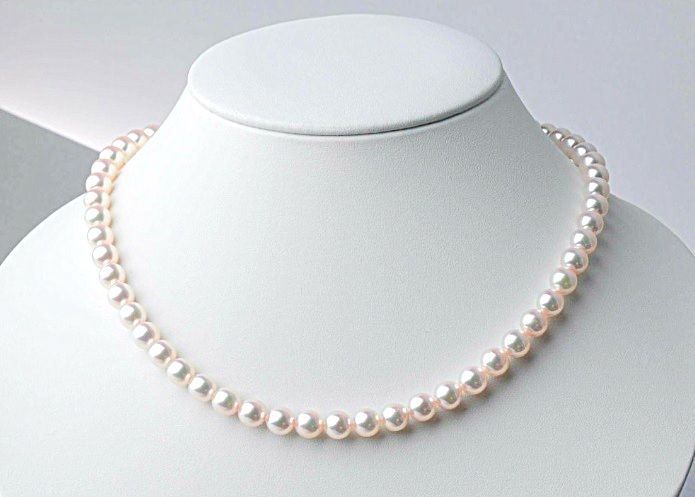Akoya pearl necklace with 7.0mm-7.5mm white round to semi-round pearls and stainless steel push clasp