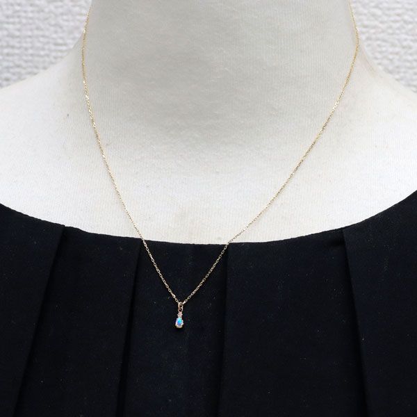 Agete K10YG opal and diamond pendant necklace with a 40 cm chain and small rectangular opal gemstone