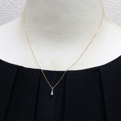 Agete K10YG opal and diamond pendant necklace with a 40 cm chain and small rectangular opal gemstone