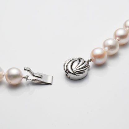 Akoya pearl necklace with 9-9.5mm semi-round baroque pearls and silver rhodium plated clasp, 45cm length