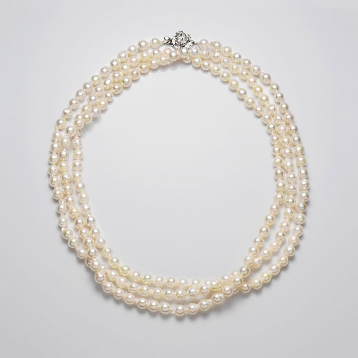 Akoya cultured pearl 5.5-6mm baroque shape long 120cm necklace with silver clasp on white background