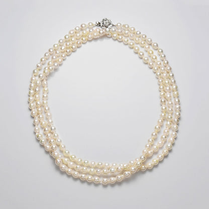 Akoya cultured pearl 5.5-6mm baroque shape long 120cm necklace with silver clasp on white background