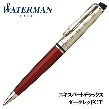 Waterman Expert Deluxe black ballpoint pen with brass shiny translucent lacquer finish and twist mechanism