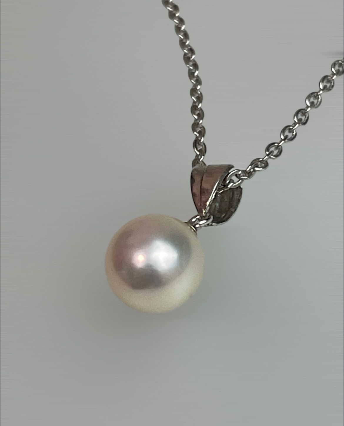 Akoya pearl necklace with a single 8.5mm white pearl on a silver chain