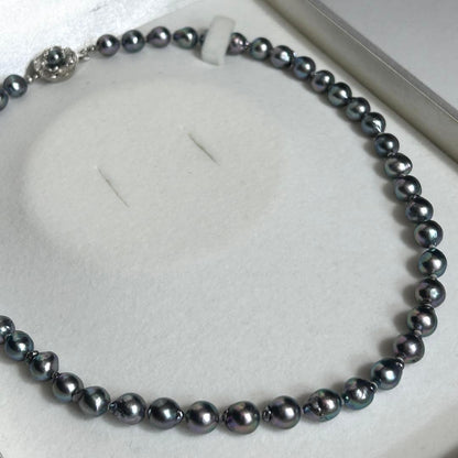 Blue Akoya pearl necklace featuring 8mm baroque pearls with silver metal fittings, 45.5cm length