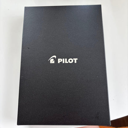 Pilot multi-function pen in navy color with a protective case displayed