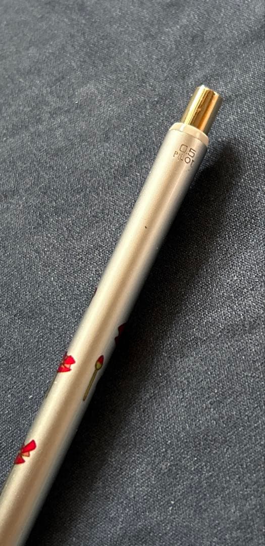 Showa era silver metal Pilot mechanical pencil with flower pattern, vintage design, minor small scratches