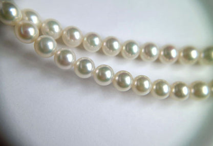 Tasaki long necklace featuring 6-6.5mm Akoya pearls on an 82.5cm silver chain with 925 clasp