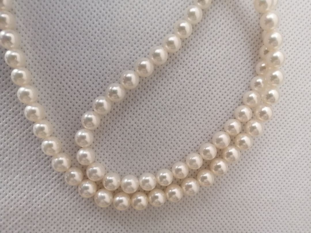 Tasaki long necklace featuring 6-6.5mm Akoya pearls on an 82.5cm silver chain with 925 clasp