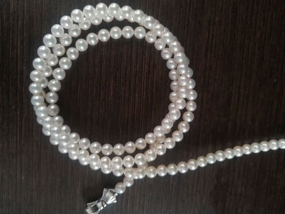 Tasaki long necklace featuring 6-6.5mm Akoya pearls on an 82.5cm silver chain with 925 clasp