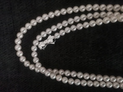 Tasaki long necklace featuring 6-6.5mm Akoya pearls on an 82.5cm silver chain with 925 clasp