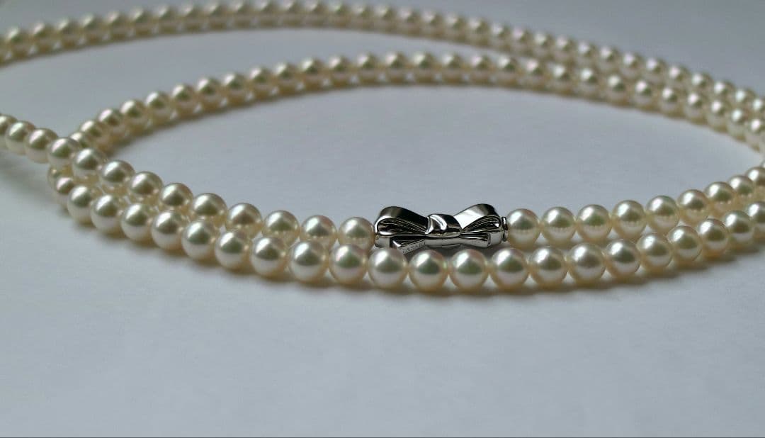 Tasaki long necklace featuring 6-6.5mm Akoya pearls on an 82.5cm silver chain with 925 clasp