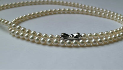 Tasaki long necklace featuring 6-6.5mm Akoya pearls on an 82.5cm silver chain with 925 clasp