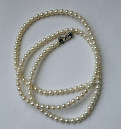 Tasaki long necklace featuring 6-6.5mm Akoya pearls on an 82.5cm silver chain with 925 clasp