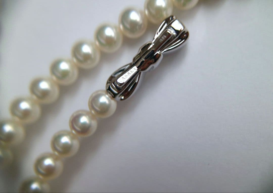 Tasaki long necklace featuring 6-6.5mm Akoya pearls on an 82.5cm silver chain with 925 clasp