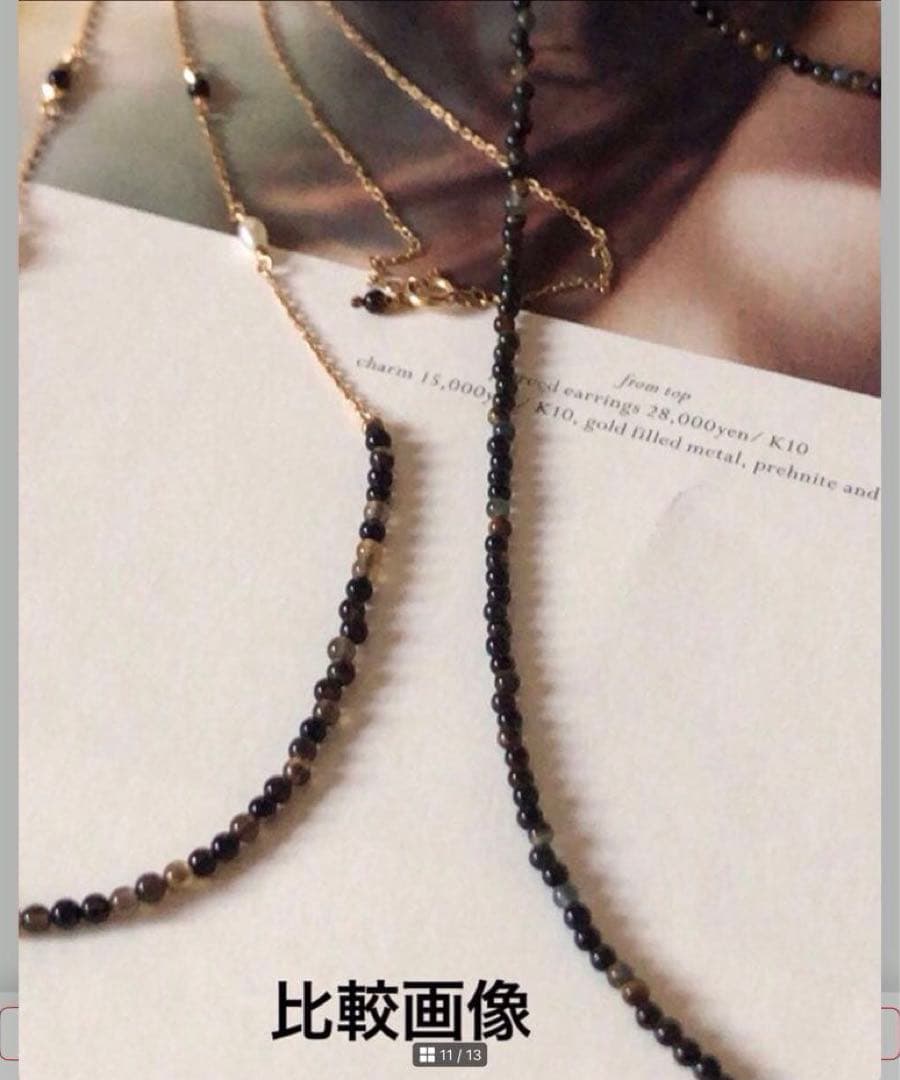 Agete SV Agate long sterling silver necklace with cross charm on white background