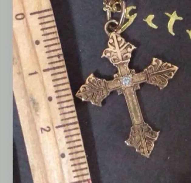 Agete SV Agate long sterling silver necklace with cross charm on white background