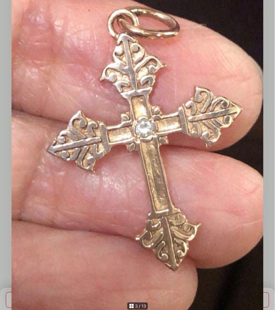 Agete SV Agate long sterling silver necklace with cross charm on white background