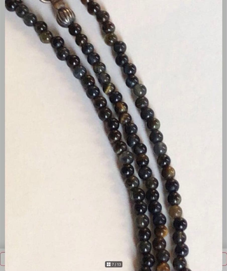 Agete SV Agate long sterling silver necklace with cross charm on white background