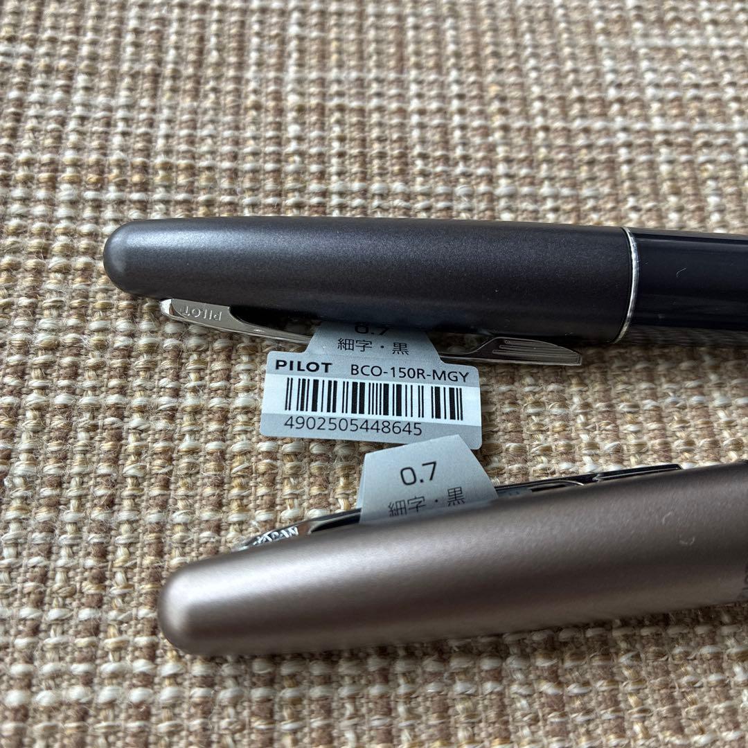 Two-piece set of Pilot Cocoon ballpoint pens with black ink and gray barrel shown side by side