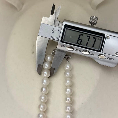 White Akoya pearl necklace with 6.5-7.0mm pearls, 42 cm length, weighing 28 grams