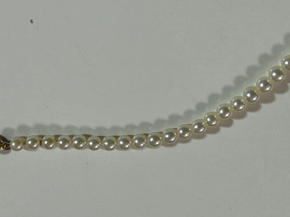 Mikimoto 18-karat gold clasp baby pearl necklace with 3.5mm pearls and 40.5cm length