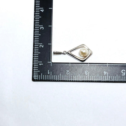 Mikimoto pearl necklace pendant with 4.5mm white pearls on a silver chain