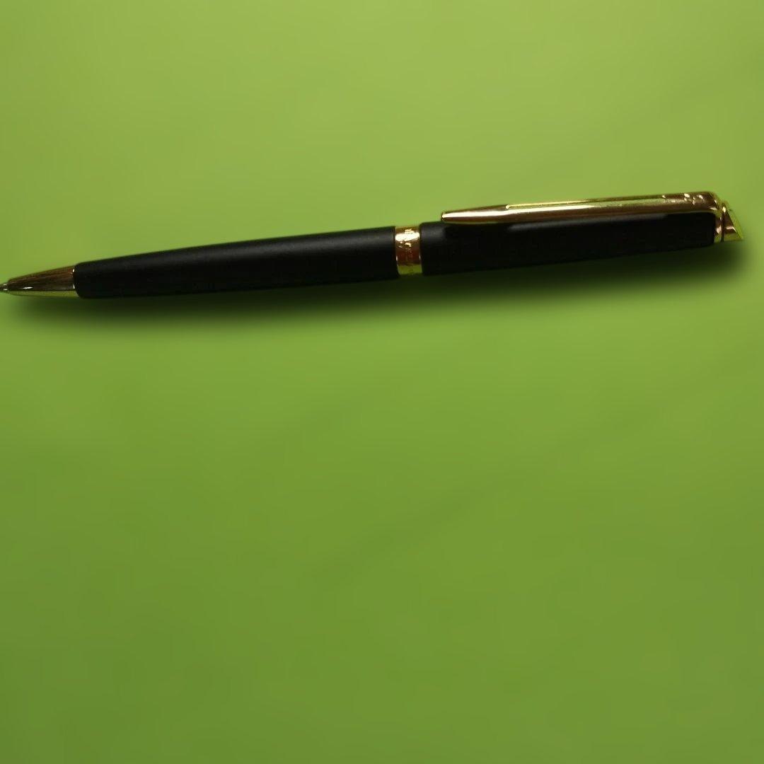 WATERMAN ballpoint pen in matte black with gold trim shown on white background