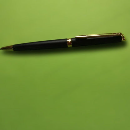 WATERMAN ballpoint pen in matte black with gold trim shown on white background