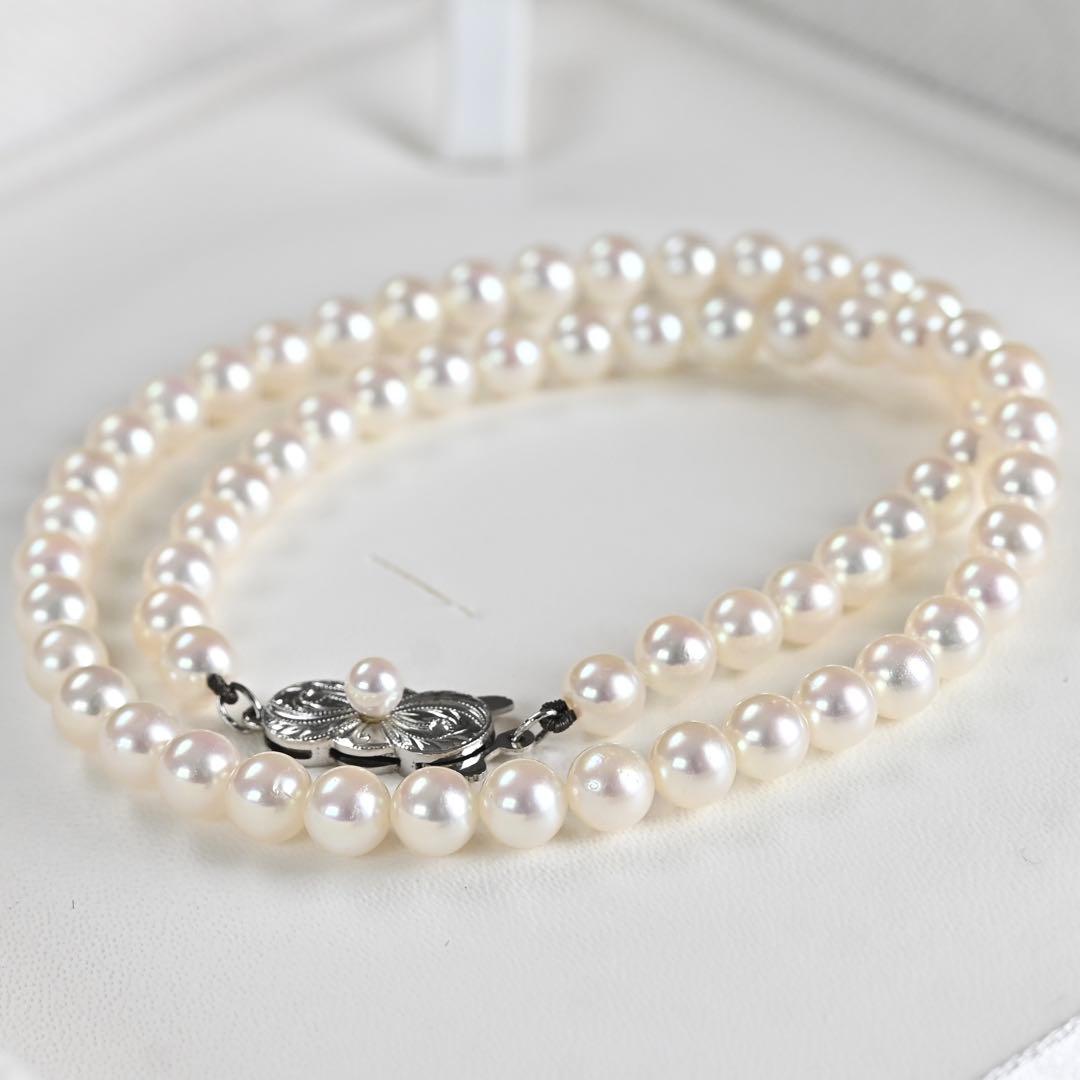 Hana-dama grade Mikimoto Akoya pearl necklace with round 6-5.5mm pearls and silver clasp in aurora pink color