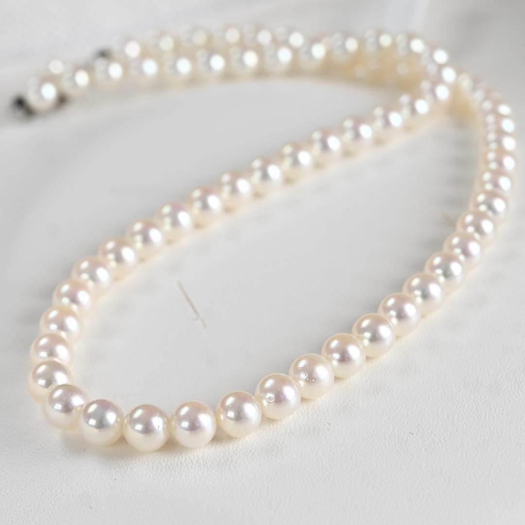 Hana-dama grade Mikimoto Akoya pearl necklace with round 6-5.5mm pearls and silver clasp in aurora pink color