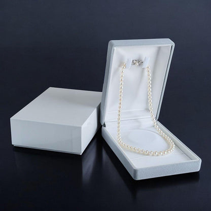 Hana-dama grade Mikimoto Akoya pearl necklace with round 6-5.5mm pearls and silver clasp in aurora pink color