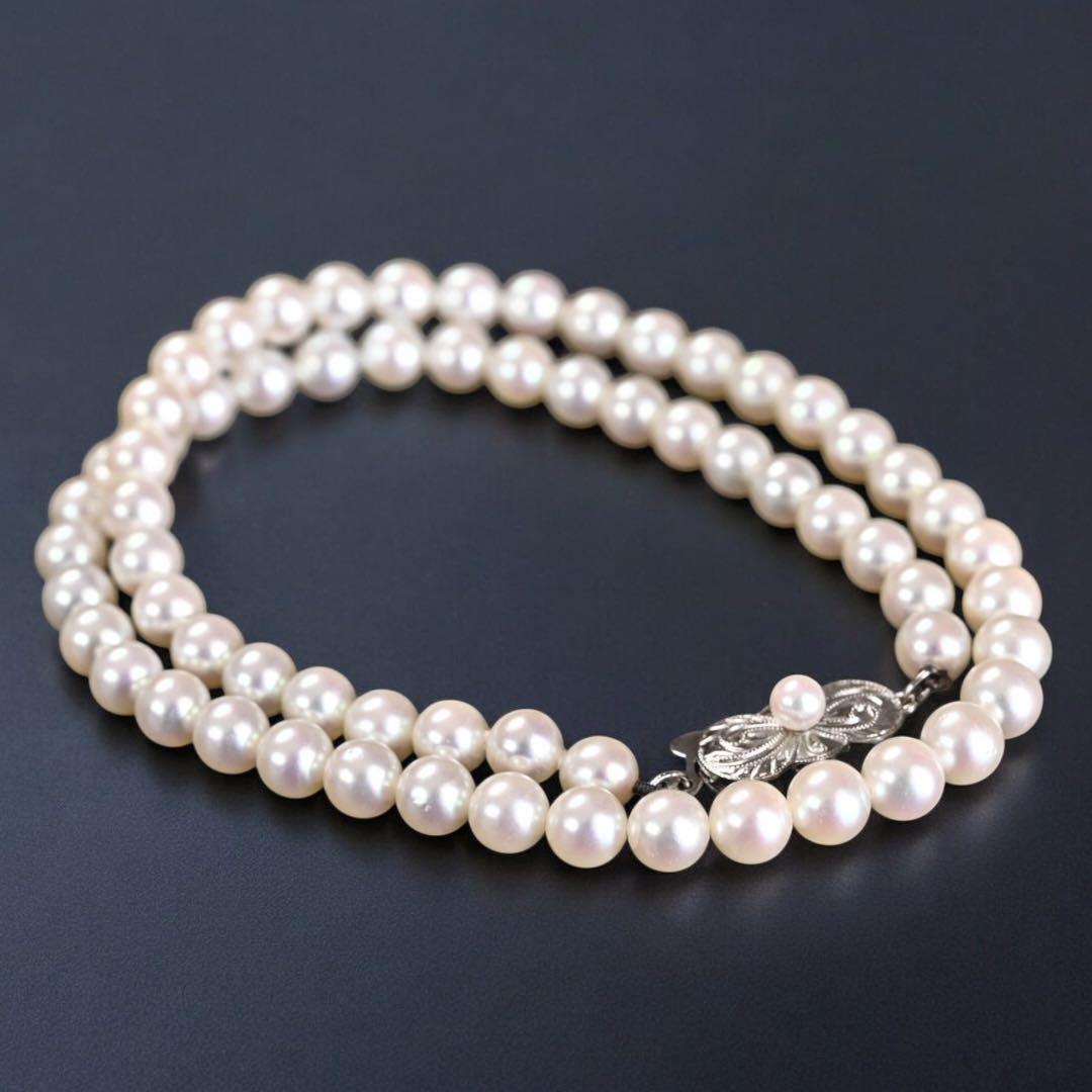 Hana-dama grade Mikimoto Akoya pearl necklace with round 6-5.5mm pearls and silver clasp in aurora pink color