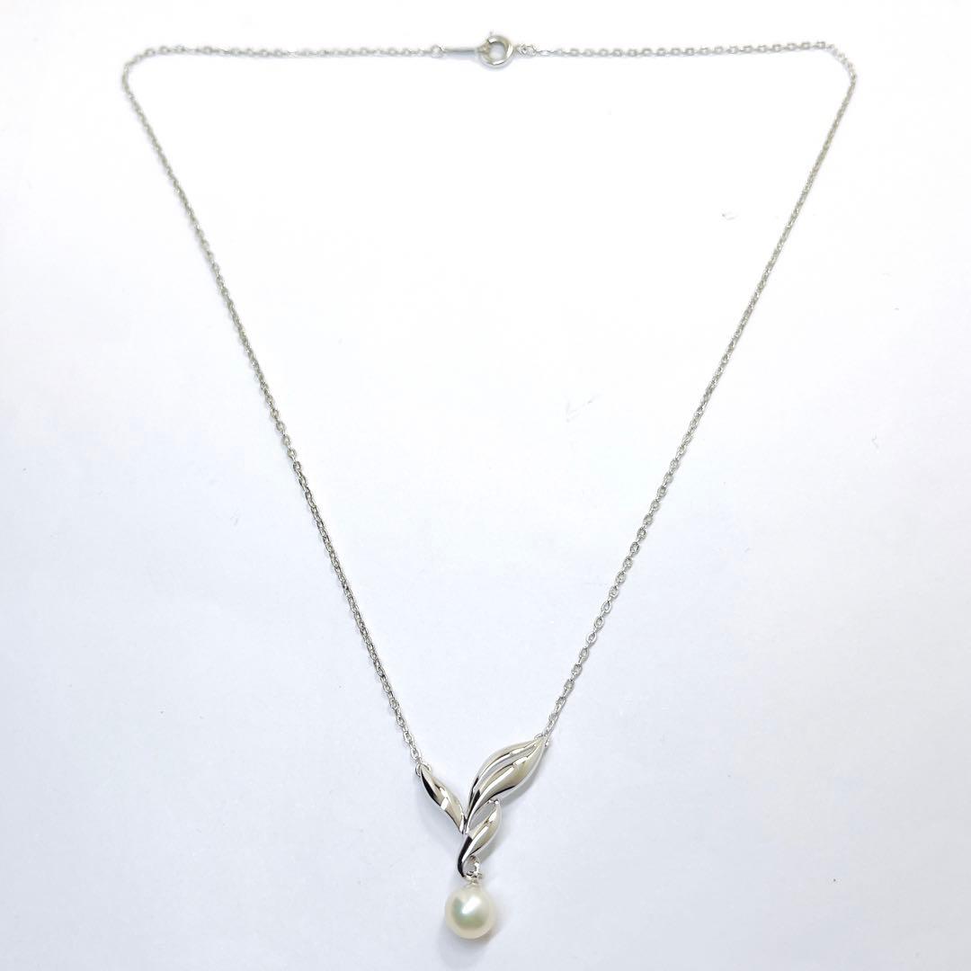 Mikimoto pearl necklace featuring a 6.7mm pearl and silver leaf pendant on a 42cm chain