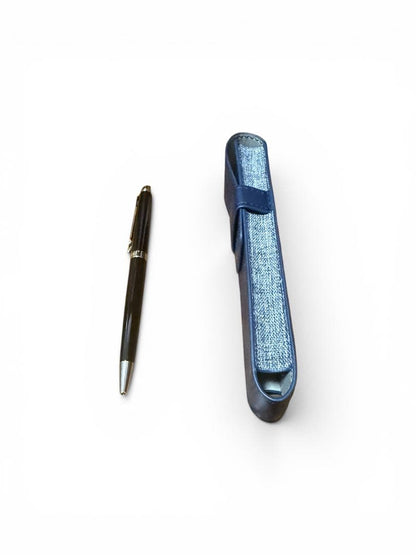 WATERMAN ballpoint pen with black body and blue dedicated pen case set on white background