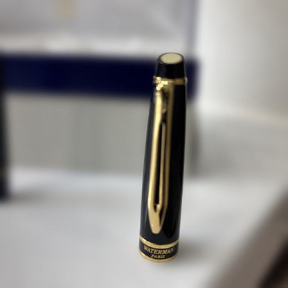 Waterman black and gold ballpoint pen with dedicated case and stained outer paper box