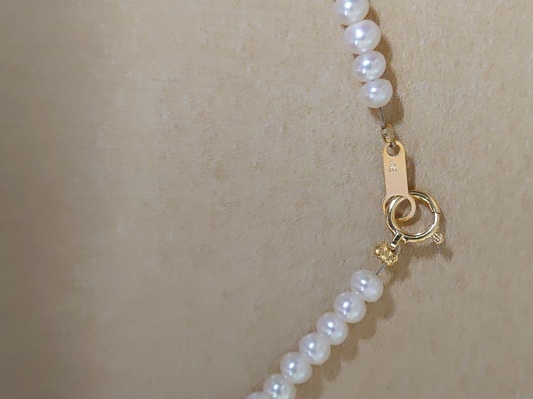 K18 Pearl Necklace with Akoya pearls and K18 clasp displayed on a white background