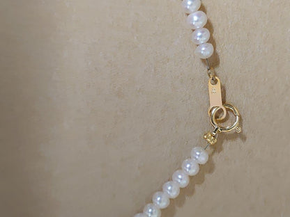 K18 Pearl Necklace with Akoya pearls and K18 clasp displayed on a white background