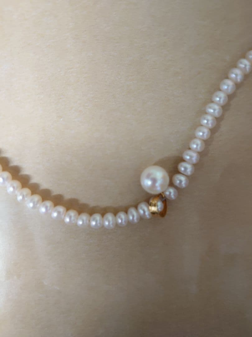 K18 Pearl Necklace with Akoya pearls and K18 clasp displayed on a white background