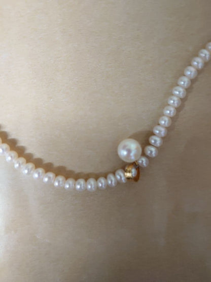 K18 Pearl Necklace with Akoya pearls and K18 clasp displayed on a white background