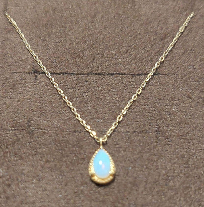 Agate K10 Opal necklace with 40cm gold chain and small 0.6cm by 0.4cm opal pendant