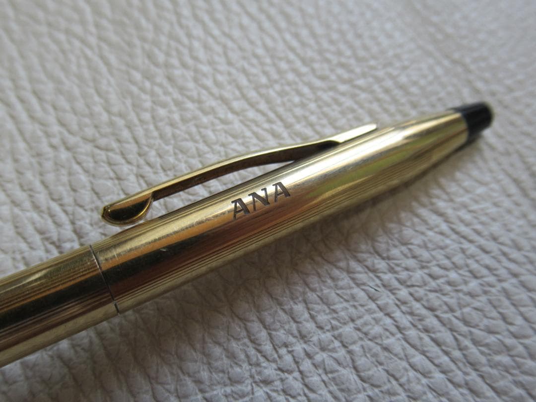 Set of three Cross Classic Century metal ballpoint pens on white background
